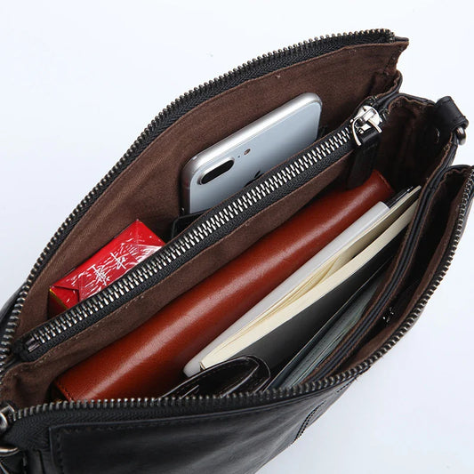 Premium cowhide leather crossbody bag with versatile internal compartments, perfect for the modern British fashionista