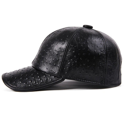 A stylish men's baseball cap made from warm, first-layer cowhide leather with an eye-catching ostrich pattern design.