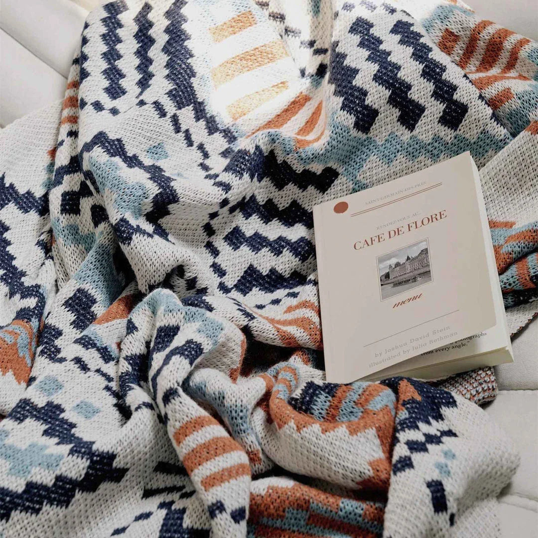 Boho geometric design cotton blanket in various sizes, perfect for indoor and outdoor use