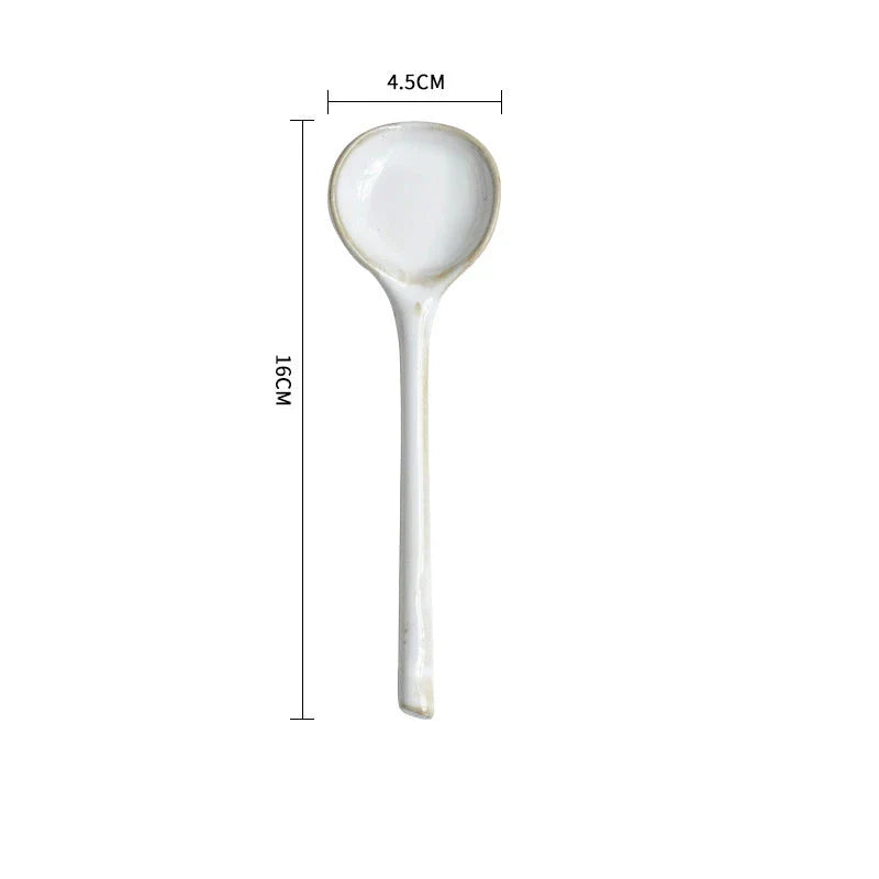 Elegant ceramic soup spoon with long handle and vibrant grey glaze, perfect for refined dining experiences