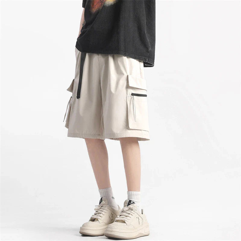 Trendy multi-pocket workwear shorts in a variety of colours, including black, khaki, green, and light grey, with a straight-leg design and ample storage options.
