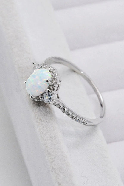 A stunning platinum-plated opal ring made from 925 sterling silver, featuring a modern and minimalist design