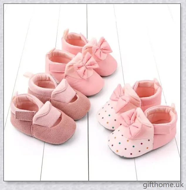Charming baby toddler shoes with a stylish bowknot design, featuring a breathable cotton upper and non-slip sole for comfort and security.