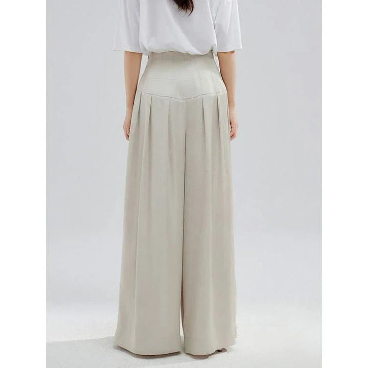 Elegant high-waisted wide-leg trousers for stylish women, featuring a unique patchwork design and premium cotton-polyester blend fabric
