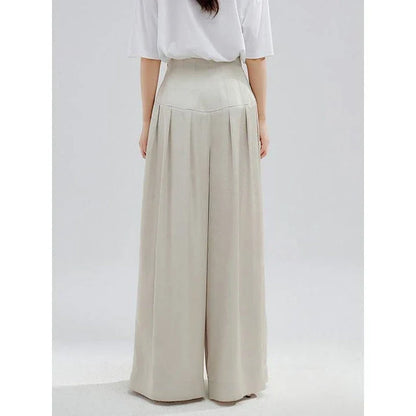 Elegant high-waisted wide-leg trousers for stylish women, featuring a unique patchwork design and premium cotton-polyester blend fabric