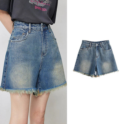 Vintage-inspired high-waisted denim shorts with tassel detailing for women