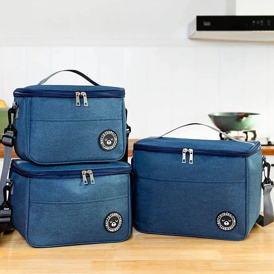 Premium thermal lunch bag in various colours, featuring insulation, waterproof design, and adjustable shoulder strap for busy UK professionals