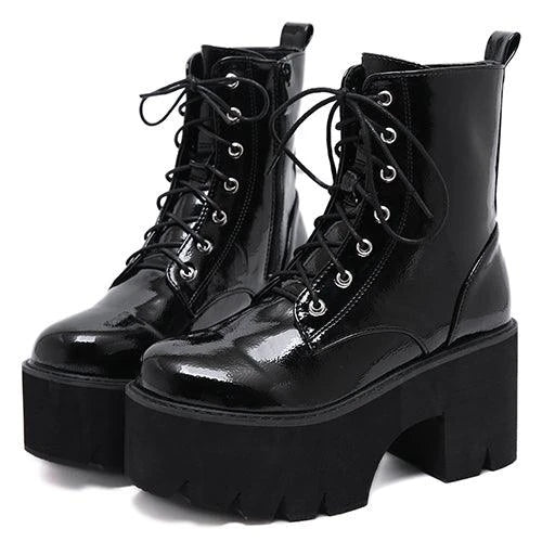 Premium lace-up high heel ankle boots in black, featuring a secure closure, supportive heel, and sleek, sophisticated silhouette.