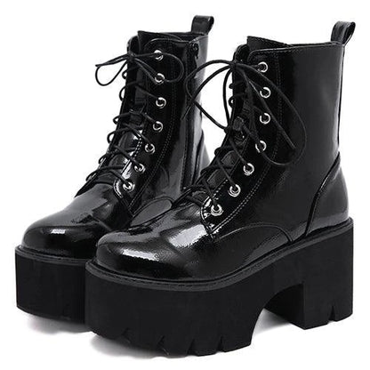 Premium lace-up high heel ankle boots in black, featuring a secure closure, supportive heel, and sleek, sophisticated silhouette.