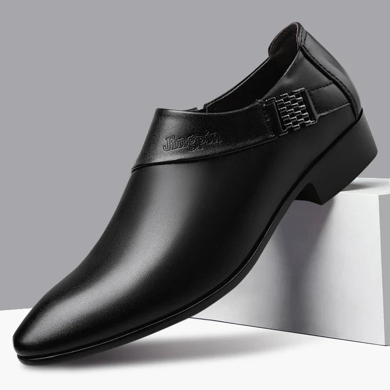 A pair of sophisticated men's leather shoes in black and brown, suitable for both casual and formal wear