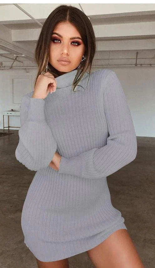 Premium long-sleeved ribbed dress in black, navy, and burgundy colours. Featuring a sophisticated and comfortable design for everyday wear.