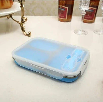 Collapsible silicone lunch box in orange colour, featuring a leakproof design and 1100ml capacity for on-the-go meals.