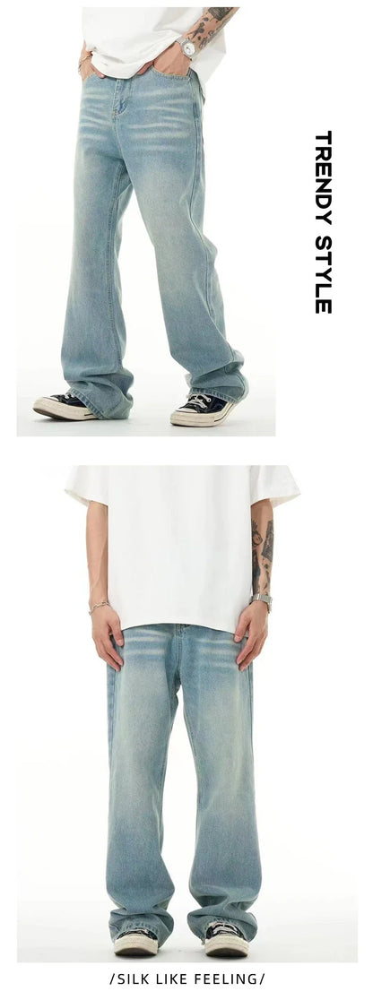 Premium light blue washed relaxed fit jeans with subtle fading and distressing, made from high-quality cotton for exceptional comfort and durability.