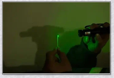 A high-powered green laser pointer pen with adjustable star cap and rechargeable design for presentations, stargazing, and versatile applications.