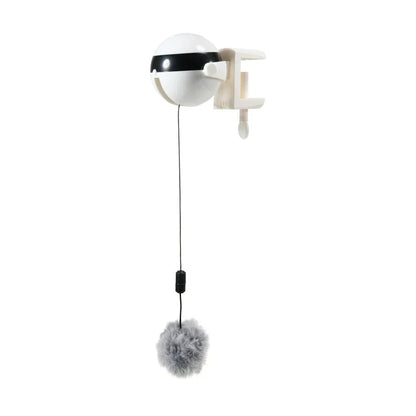 Electric automatic lifting cat ball toy in grey, white, and black colours, designed to captivate and entertain cats with its engaging puzzle features.
