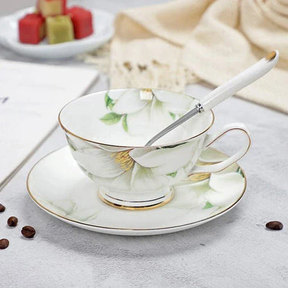 Charming floral porcelain tea set with cup, saucer, and spoon in a variety of delicate colour options