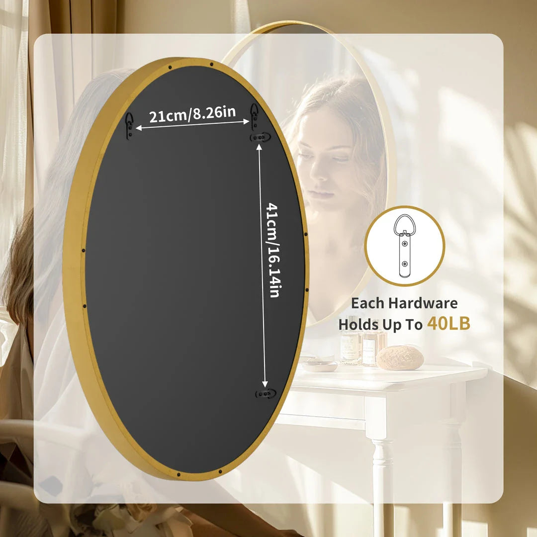 Elegant oval gold wall mirror with brushed gold metal frame, contemporary decorative accent for bedrooms, living rooms, and hallways.