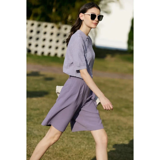 Elegant wide-leg shirred shorts for women, featuring a refined design and comfortable fit for the British summer