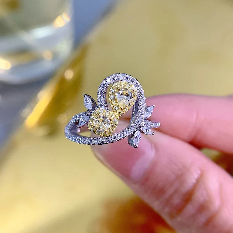 Elegant 925 sterling silver fashion ring with a yellow diamond centre stone