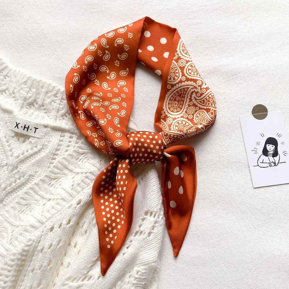 Luxury silk-feel narrow scarf in blue colour, a versatile fashion accessory for the modern British woman