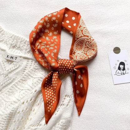 Luxury silk-feel narrow scarf in blue colour, a versatile fashion accessory for the modern British woman