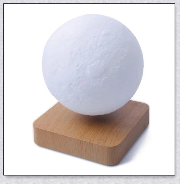 Lunamen Magnetic Levitating Moon Lamp with detailed lunar surface and floating above magnetic base
