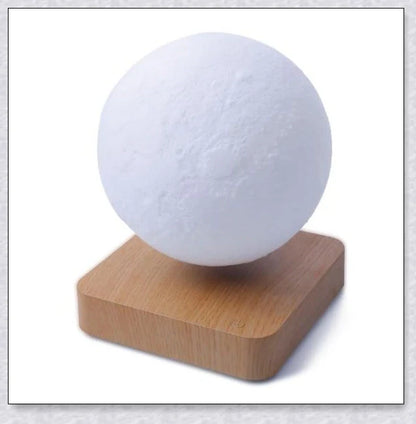 Lunamen Magnetic Levitating Moon Lamp with detailed lunar surface and floating above magnetic base