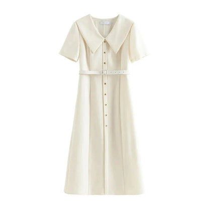 Elegant mid-calf summer dress in a sophisticated style, suitable for professional office wear and special occasions.