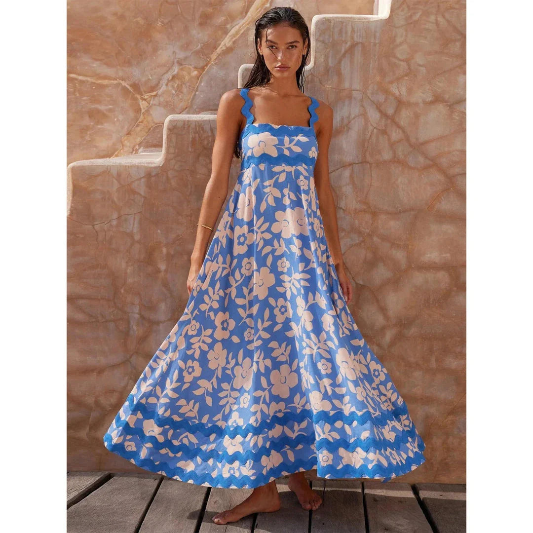 Luxurious dot print ankle-length dress with flounced edge, perfect for sophisticated style and all-day comfort.