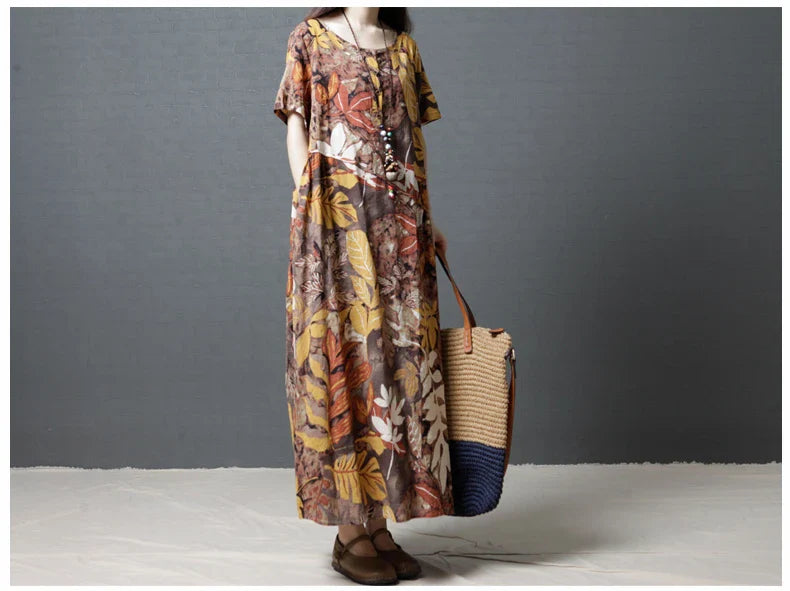 Elegant cotton and linen long dress in a classic blue hue, showcasing the high-quality natural fabrics and timeless British design.