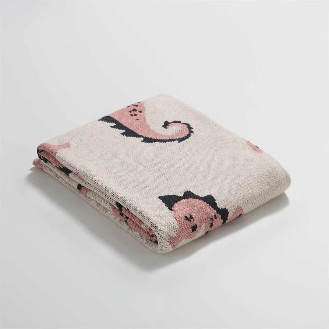 Soft and cosy 100% cotton blanket with a charming sea horse design, perfect for relaxation at home or on the go.