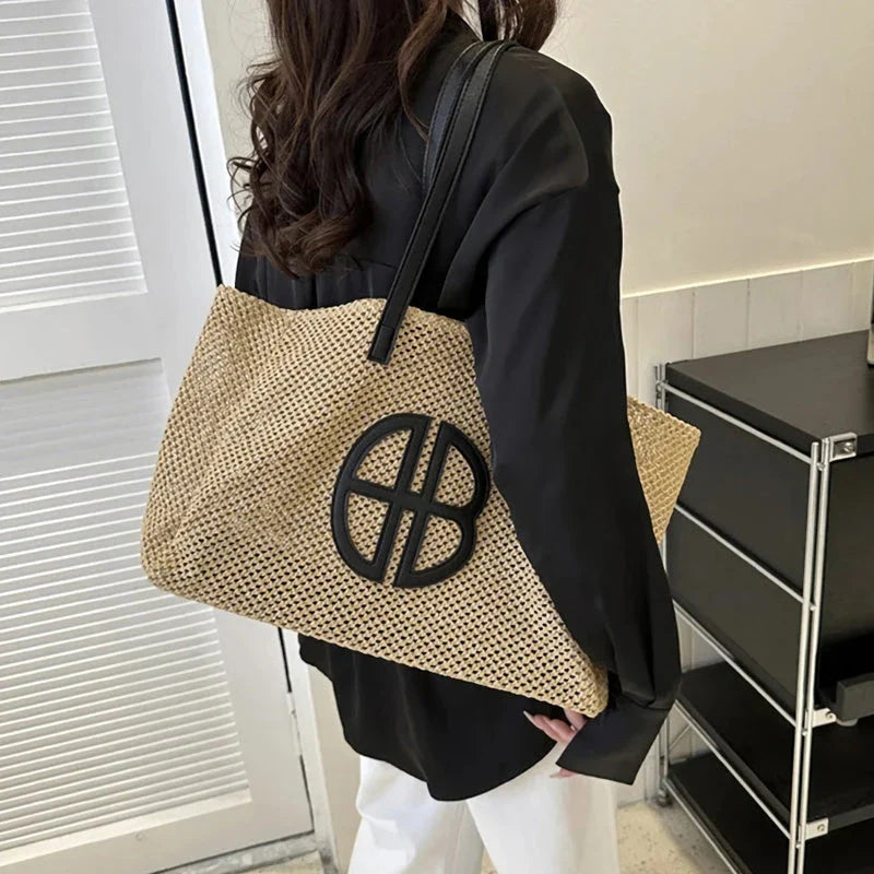A handmade straw tote bag with a unique hollow-out knitting design, featuring a soft faux fur lining and a spacious interior for versatile use.