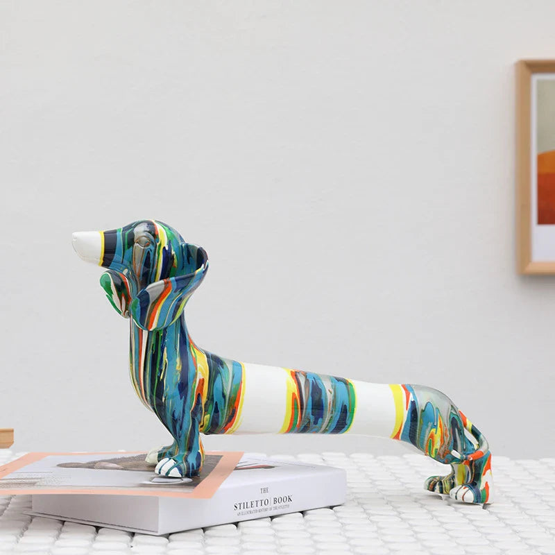 A delightful resin figurine depicting a charming Dachshund dog, featuring a modern and simplified design with vibrant colors.