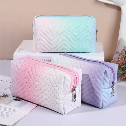 Elegant gradient-coloured makeup bag made of premium PU leather, perfect for organised storage and travel