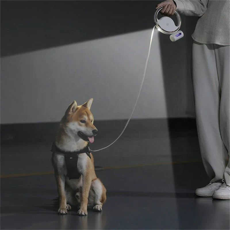 A 3m retractable dog leash with a built-in flashlight and waste bag holder, designed for convenient and safe dog walking.