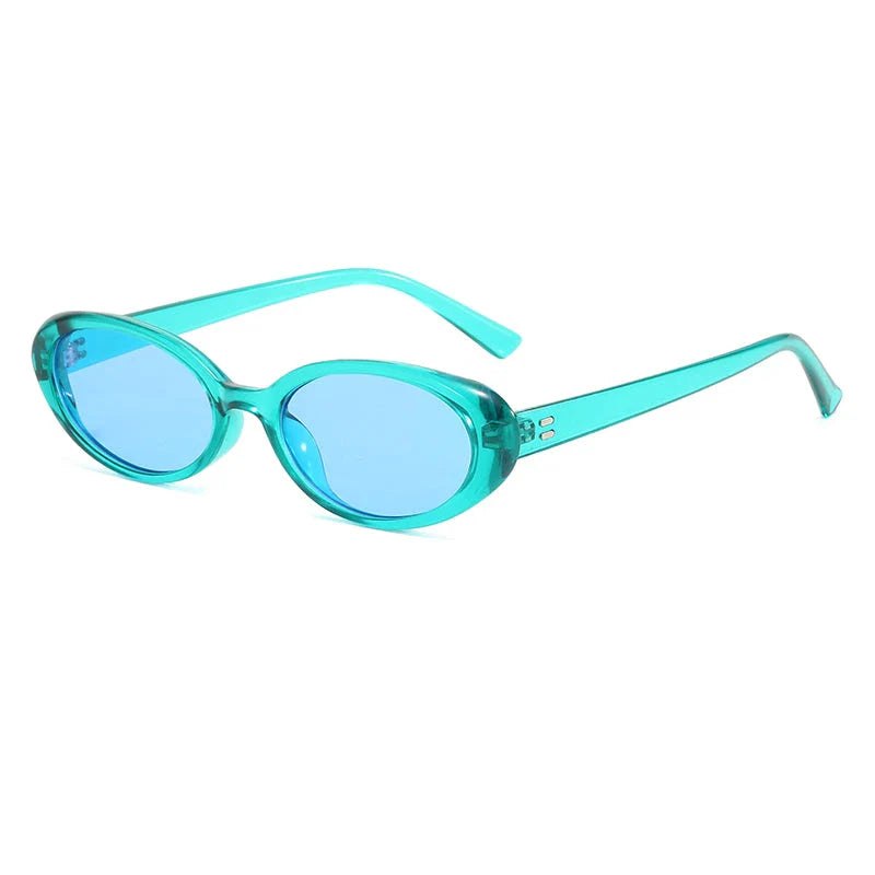 Oval-shaped women's sunglasses in a white and grey colour, offering UV protection and a stylish, retro-inspired design.