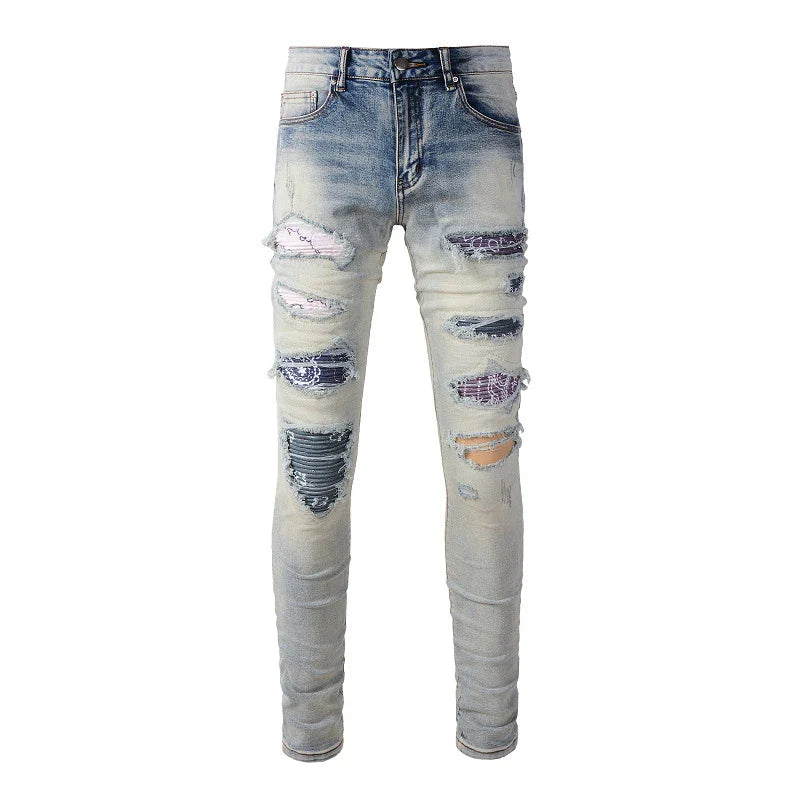 Stylish distressed denim jeans with a skinny, knee-exposed silhouette for a contemporary, high-street fashion look