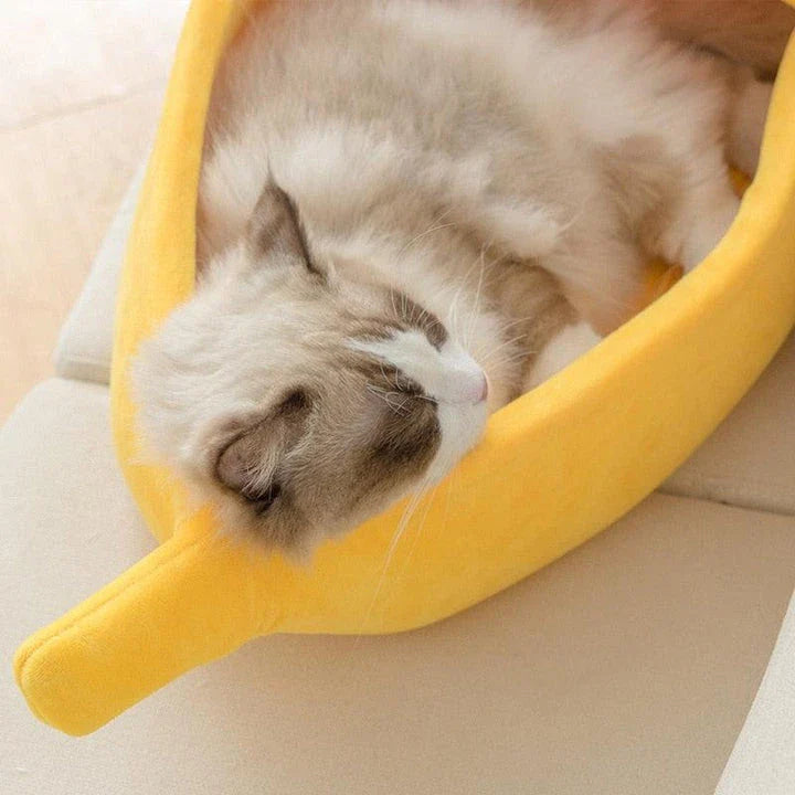 Cosy, plush banana-shaped cat bed in a variety of sizes, providing a comfortable retreat for feline friends