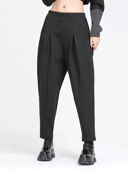 Stylish high elastic waist black harem trousers with a split joint design, offering a comfortable and fashionable look
