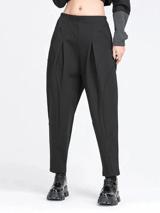 Stylish high elastic waist black harem trousers with a split joint design, offering a comfortable and fashionable look