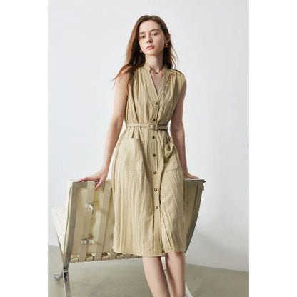 Elegant sleeveless midi shirt dress with V-neck and side pockets, perfect for summer in the UK