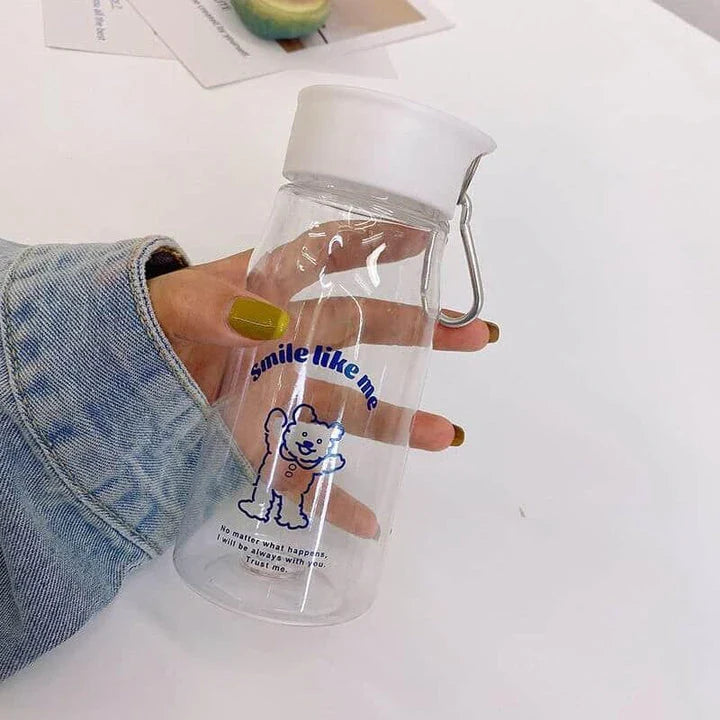 A frosted plastic water bottle with a cartoon dog design, perfect for everyday hydration and a fun, playful look.