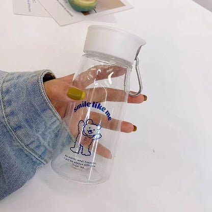 A frosted plastic water bottle with a cartoon dog design, perfect for everyday hydration and a fun, playful look.