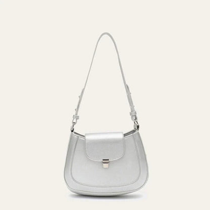 Elegant and versatile vegan leather shoulder bag with adjustable strap, flap cover, and interior pockets for modern British women
