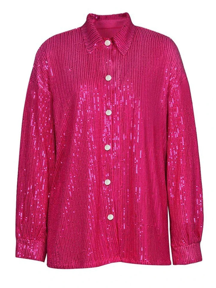 Elegant woman wearing a luxurious sequin top and pants set, perfect for a glamorous evening event