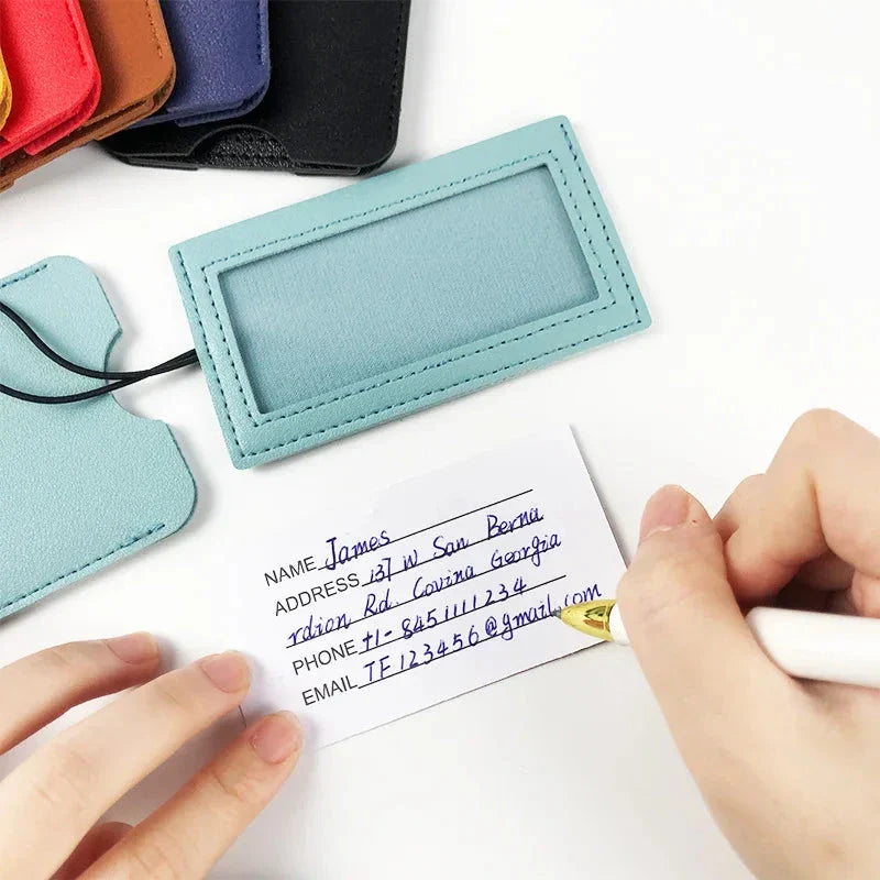 Premium PU leather luggage tags in a vibrant gray colour, with a discreet pull-out information card for easy customization.