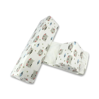 Soft, breathable cotton newborn baby sleeping pillow with adjustable fit and triangular anti-roll design for a comfortable, secure sleeping experience