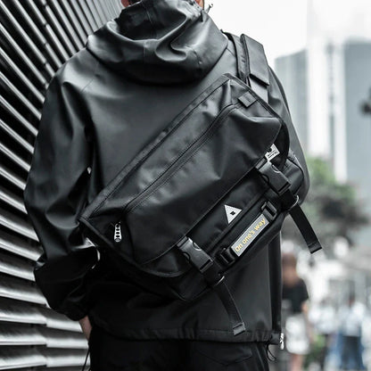 Premium casual messenger bag made with Oxford spinning material, featuring a structured yet soft exterior, ample storage space, and a water-resistant design for the modern British gentleman.