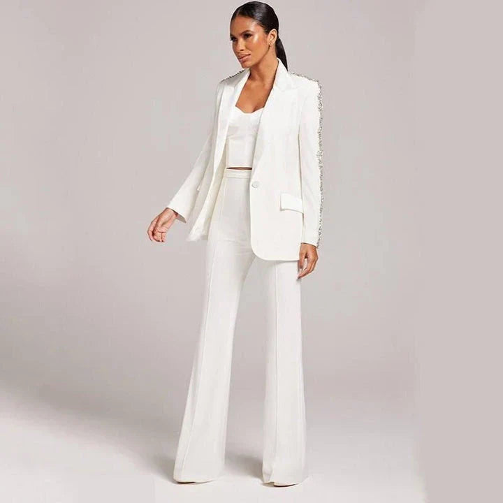 Elegant British designer women's suit set with beaded blazer and flare pants in white