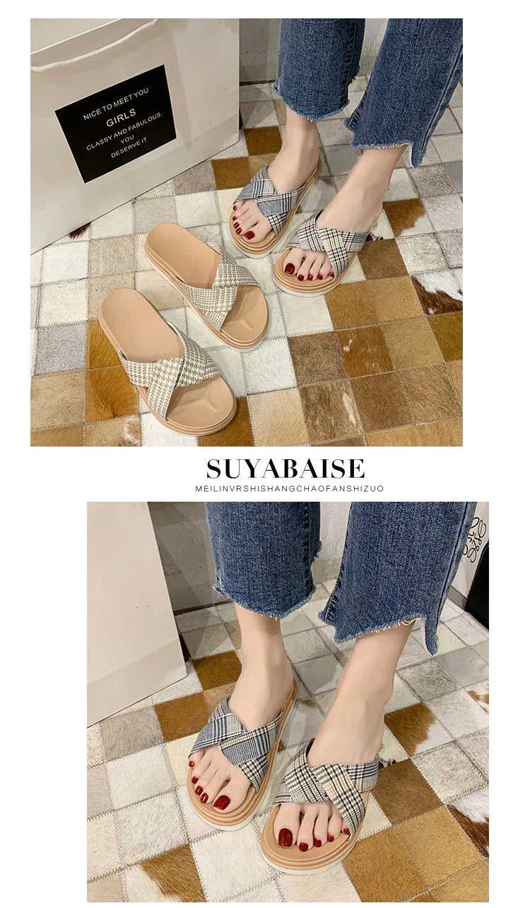 Premium non-slip herringbone slippers with a bow accent, featuring a canvas upper, fetal cowhide lining, and a rubber sole for comfort and stability.